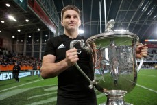 Beauden Barrett carries the Bledisloe Cup after scoring the winning try during the New Zealand All Blacks v Australia, Rugby Championship test match, Forsyth Barr stadium, Dunedin, New Zealand. 26 August 2017. Copyright Image: Derek Morrison / www.photospo