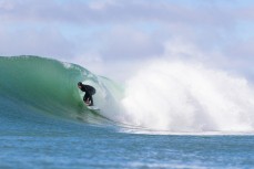 Damian Phillips gets barreled in a punchy swell at Aramoana, Dunedin, New Zealand.