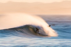 Damian Phillips finds a barrel in fun arvo waves at Blackhead Beach, Dunedin, New Zealand.