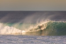 James Murphy gets barrelled in fun afternoon waves at St Kilda, Dunedin, New Zealand.