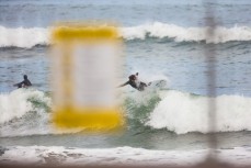 Elliott Brown takes flight in rampy waves at St Clair, Dunedin, New Zealand.