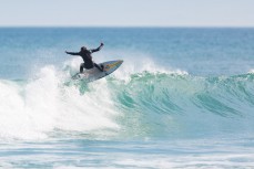 Rising grom Luke Rogers finding some great waves at St Kilda, Dunedin, New Zealand.