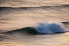 Spring winds airbrush a ground swell at Blackhead Beach, Dunedin, New Zealand.