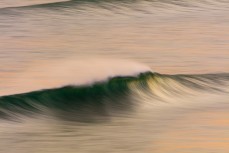 Spring winds airbrush a ground swell at Blackheaqd Beach, Dunedin, New Zealand.