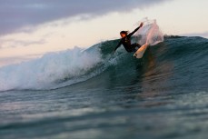 Elliott Brown makes the most of a summer ground swell at St KIlda, Dunedin, New Zealand.
