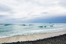Tiny swell at Blackhead Beach, Dunedin, New Zealand.
