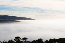 A heavy sea fog rolls into St Clair, Dunedin, New Zealand.