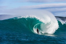 Oscar Smith rides a barrel at a remote reefbreak near Dunedin, New Zealand.