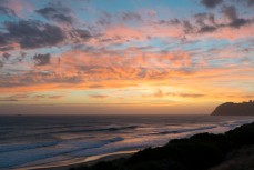 Summer sunset at St Kilda, Dunedin, New Zealand.