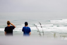 Aaron and Bryn check out a new swell a little bit raw at Raglan, Waikato, New Zealand.