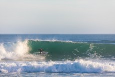 Jack McLeod sets his line during a raw ground swell at St Kilda, Dunedin, New Zealand.