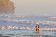 Swimmers take a late arvo dip at St Kilda, Dunedin, New Zealand.