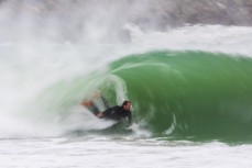 A body surfer makes the most of waves created by ex-cyclone Gita at Aramoana, Dunedin, New Zealand.