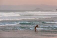 Swimmer washes her face on dusk at St Kilda, Dunedin, New Zealand.
Credit: www.boxoflight.com/Derek Morrison