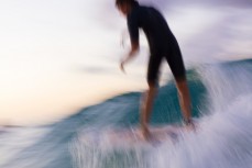 A surfer rides a wave at Snapper, a break near Coolangatta on the Gold Coast, Queensland, Australia.