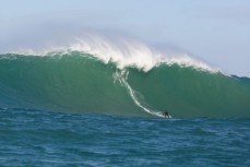 Joe Van der Geest on a giant wave at a remote reefbreak in southern New Zealand surfing the same swell that produced a record 23.8m wave to the south of Stewart Island on May 8, 2018. 