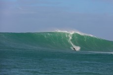 Davy Wooffinden rides a big wave at a remote reefbreak in southern New Zealand surfing the same swell that produced a record 23.8m wave to the south of Stewart Island on May 8, 2018. 