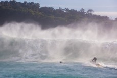 A surfer is rescued in big waves at a remote reefbreak in southern New Zealand surfing the same swell that produced a record 23.8m wave to the south of Stewart Island on May 8, 2018. 