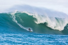 Dave Wild takes on a big wave at a remote reefbreak in southern New Zealand surfing the same swell that produced a record 23.8m wave to the south of Stewart Island on May 8, 2018. 
