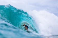 A surfer gets barreled at a Snapper Rocks near Coolangatta on the Gold Coast, Queensland, Australia.