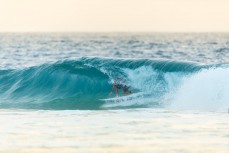 A local finds a nugget at Snapper Rocks on the Gold Coast, Queensland, Australia.