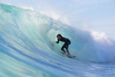 Kaya Horne finds a frothy one at Froggies near Coolangatta on the Gold Coast, Queensland, Australia.