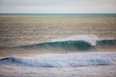 Clean peak on a cold winter ground swell at St Kilda, Dunedin, New Zealand.