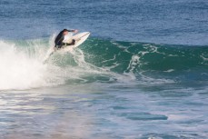 Will Lewis winds up in small fun winter waves at Blackhead, Dunedin, New Zealand. 