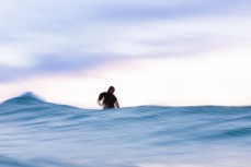 Elliott Adamson makes the most of fun wintry waves at St Kilda, Dunedin, New Zealand.