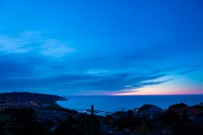 Sunrise cloud formations over St Clair, Dunedin, New Zealand. 