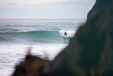Josh Thickpenny sneaking out for a session in a small winter swell at St Clair, Dunedin, New Zealand. 