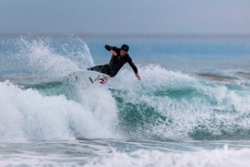 Jack McLeod makes the most of a small winter swell at St Kilda, Dunedin, New Zealand. 