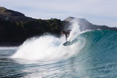 Maz Quinn makes the most of clean glassy waves at Blackhead, Dunedin, New Zealand.