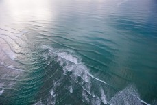 The twist of Ashley River meeting the South Pacific Ocean at Waikuku Beach, Canterbury, New Zealand.