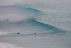 Surfers make the most of a fun winter swell at Aramoana, Dunedin, New Zealand.Credit: www.boxoflight.com/Derek Morrison