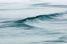 First waves of spring on a cold day at Blackhead, Dunedin, New Zealand.