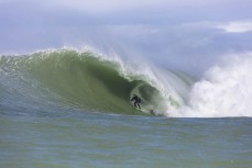 Dan Smith on form during a late-season swell at a remote reefbreak in the South Island, New Zealand. Photo: Derek Morrison