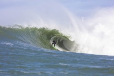 Dan Smith on form during a late-season swell at a remote reefbreak in the South Island, New Zealand. Photo: Derek Morrison