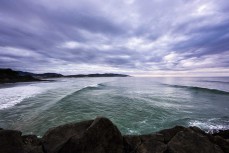 Lazy spring swell at St Clair, Dunedin, New Zealand.