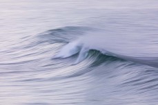 Lazy spring swell at St Clair, Dunedin, New Zealand.