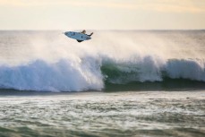 Jack McLeod punting in punchy summer waves at St Kilda, Dunedin, New Zealand.
Credit: www.boxoflight.com/Derek Morrison