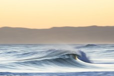 An empty wave breaks in the afternoon light at Blackhead, Dunedin, New Zealand.
Credit: www.boxoflight.com/Derek Morrison