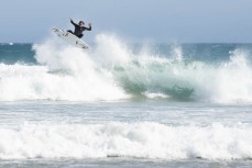 Jack McLeod still got an air game in offshore summer waves at Blackhead, Dunedin, New Zealand.