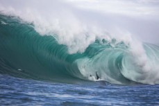 A surfer goes down hard  on a slabbing reefbreak in the South Island, New Zealand.