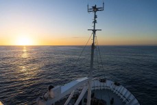 Sunrise on the Southern Ocean during a Heritage Expeditions voyage to the Sub-Antarctic Islands, New Zealand.