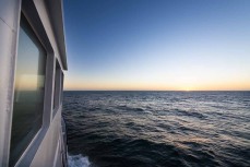 Sunset on our first night at sea during a Heritage Expeditions voyage to the Sub-Antarctic Islands, New Zealand.