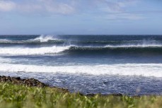 A wave breaks during a Heritage Expeditions voyage to Enderby Island in the Auckland Islands, Sub-Antarctic Islands, New Zealand.
