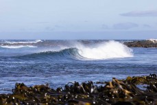 A wave breaks during a Heritage Expeditions voyage to Enderby Island in the Auckland Islands, Sub-Antarctic Islands, New Zealand.