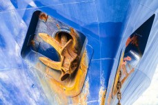 The anchors bleed rust stains on the bow of Spirit of Enderby during a Heritage Expeditions voyage to Doubtful Sound, Fiordland, New Zealand.