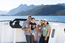 Sarah and Aaron Russ with their two girls during a Heritage Expeditions voyage to Dusky Sound in Fiordland, New Zealand.